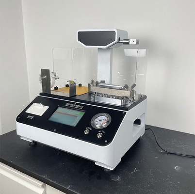 Testatore di resistenza alla legatura a strati di cartone per la rilevazione di materiali compositi di carta